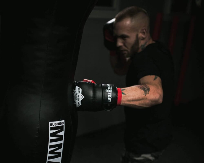BUSHIDO INSTRUMENTAL TRAINING GLOVES ON A BAG