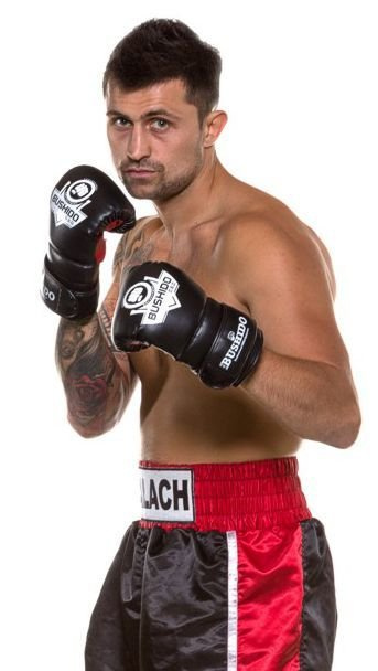 BUSHIDO INSTRUMENTAL TRAINING GLOVES ON A BAG